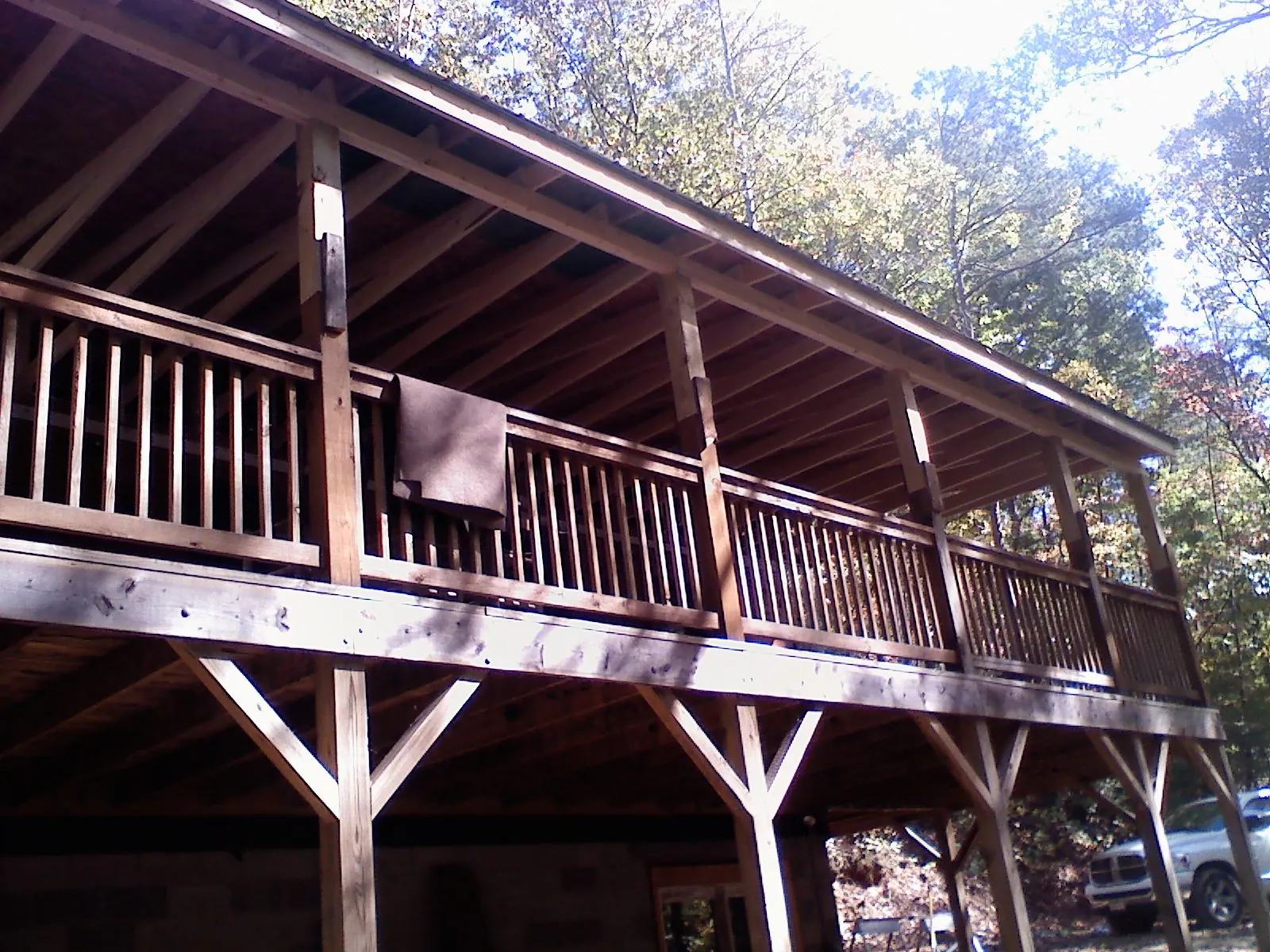 Timber framing under a new elevated porch and deck — Roof Leak Repair in Bloomfield by Roofing Brothers
